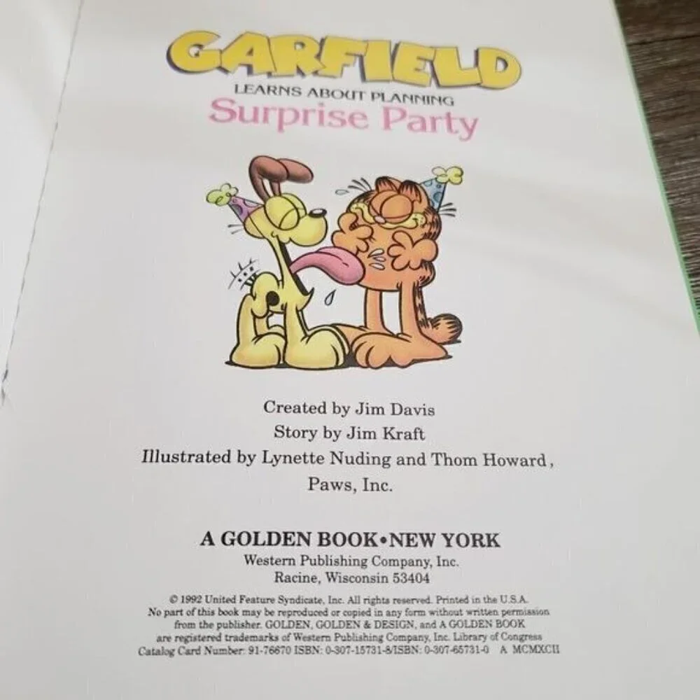 Lot of 2 Vintage Garfield Cartoon Books Endangered Odie Surprise Party
